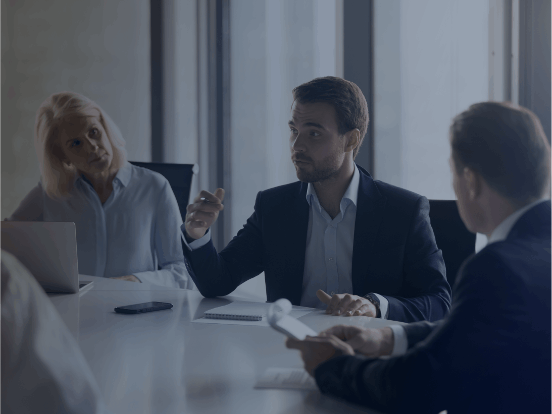 Top management discussing leadership development and CEO contingency planning